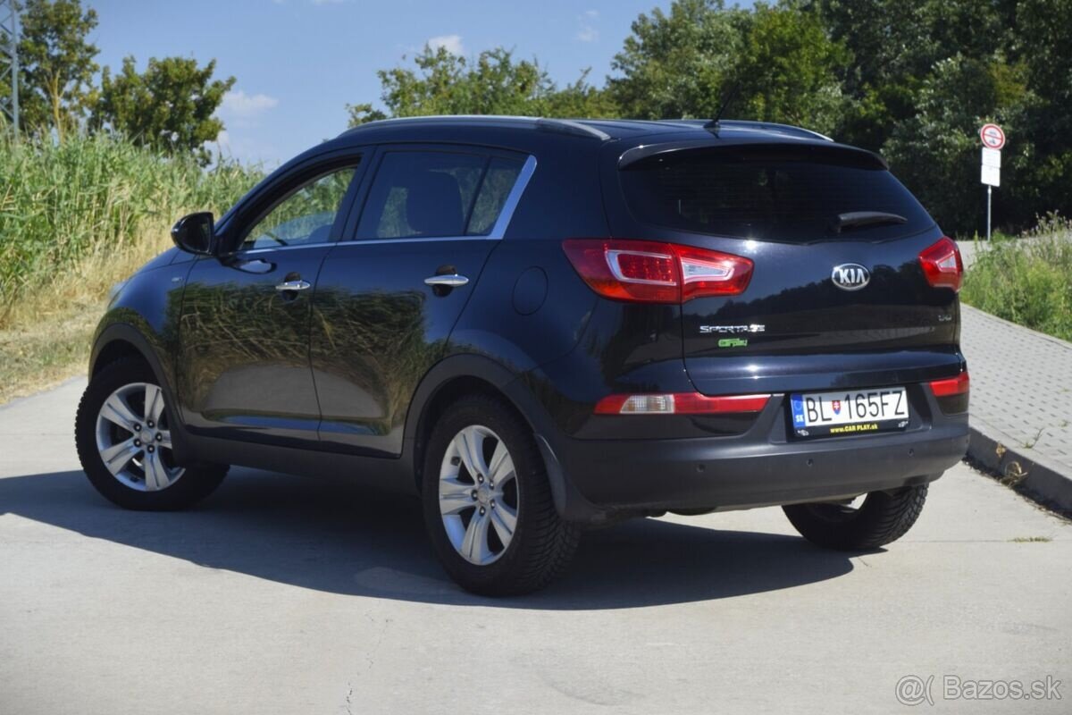 KIA Sportage 2.0 CRDI AT/6 - 7