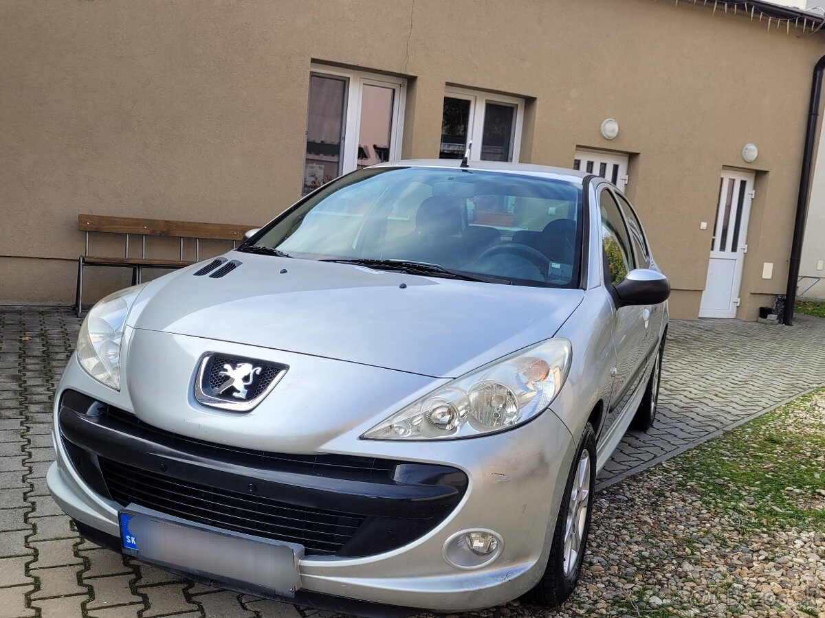 Peugeot 206 Plus  1.1.i 44kw - 7