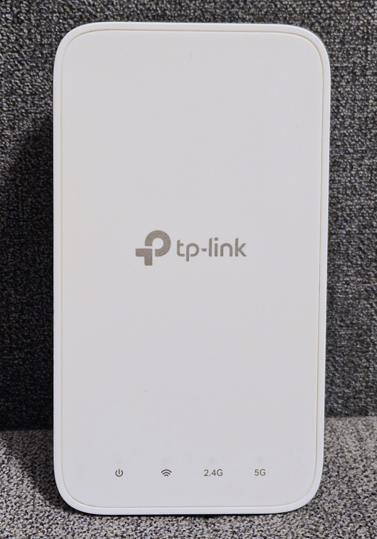 TP-Link Archer AX73 + TP-Link RE300 - 7