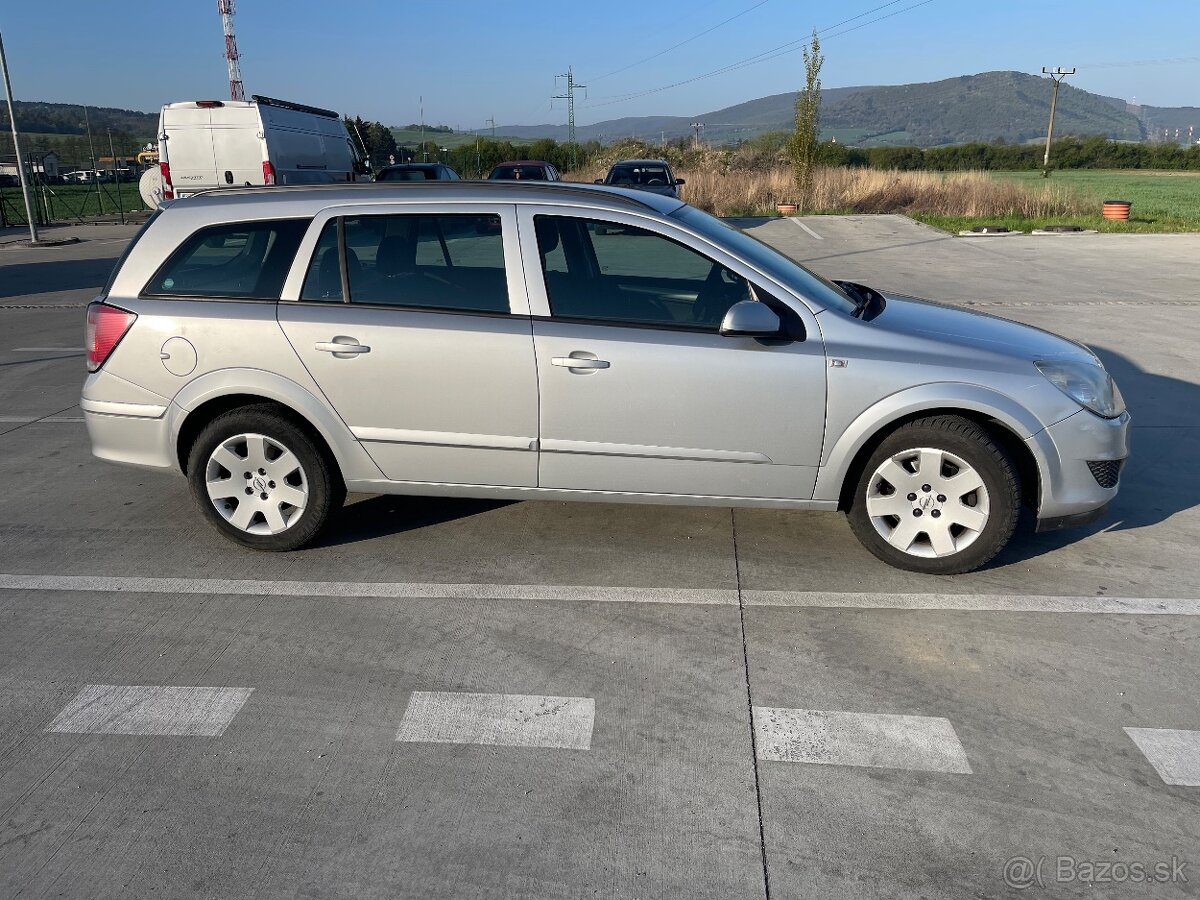 Opel astra H 1.9cdti - 7