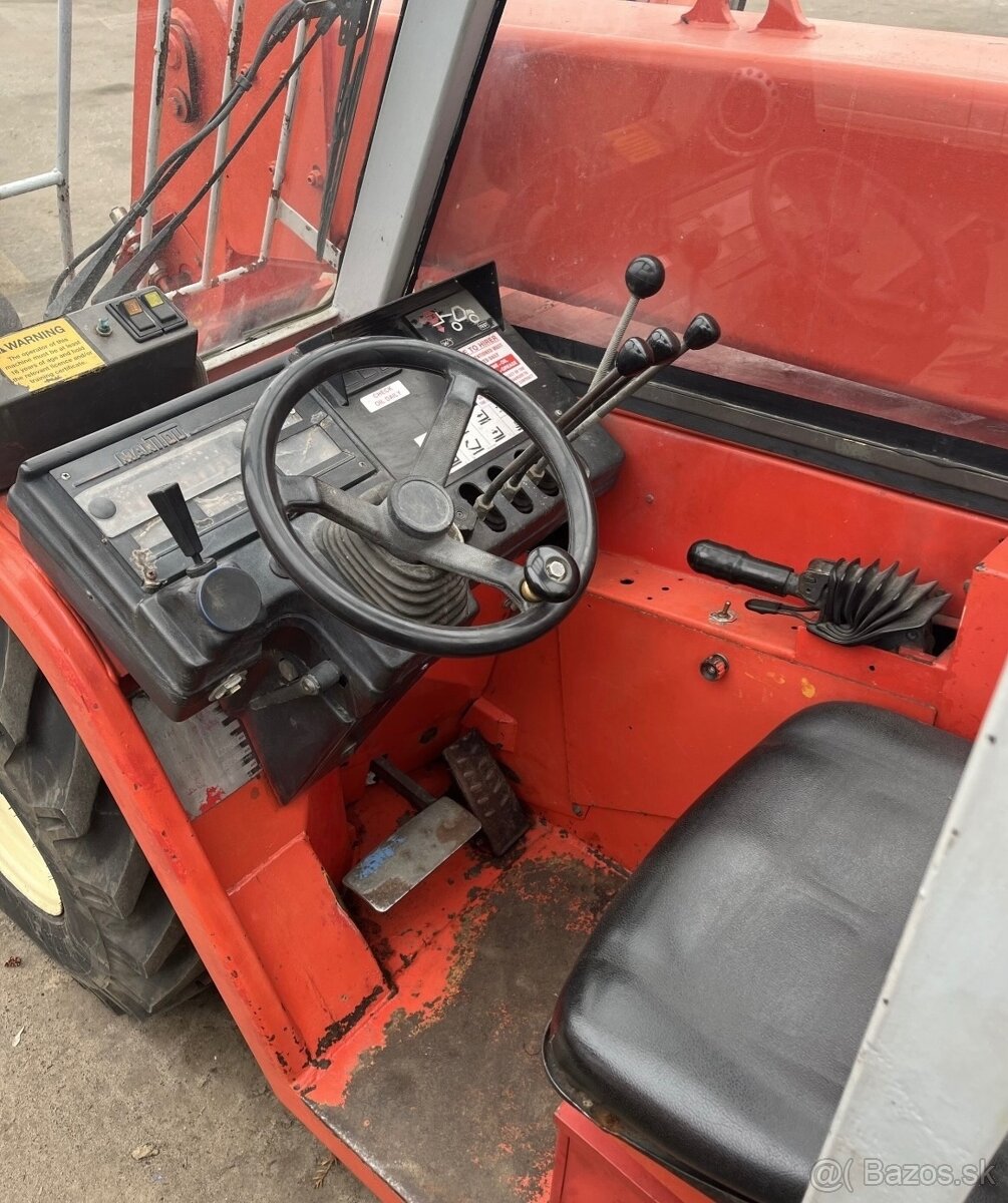 Teleskopicky nakladač Manitou - 7