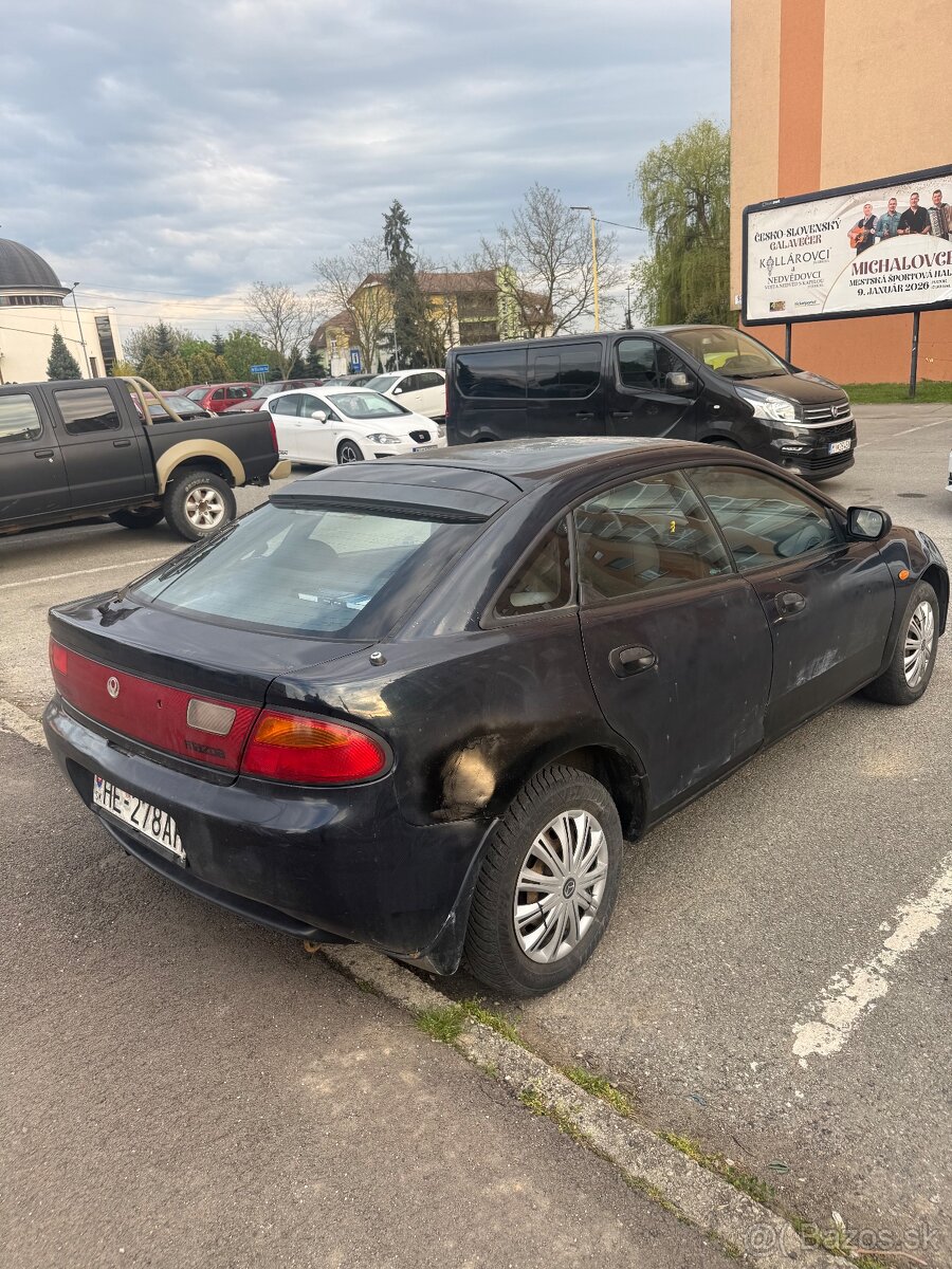 323 F 1.5 benzín - 7