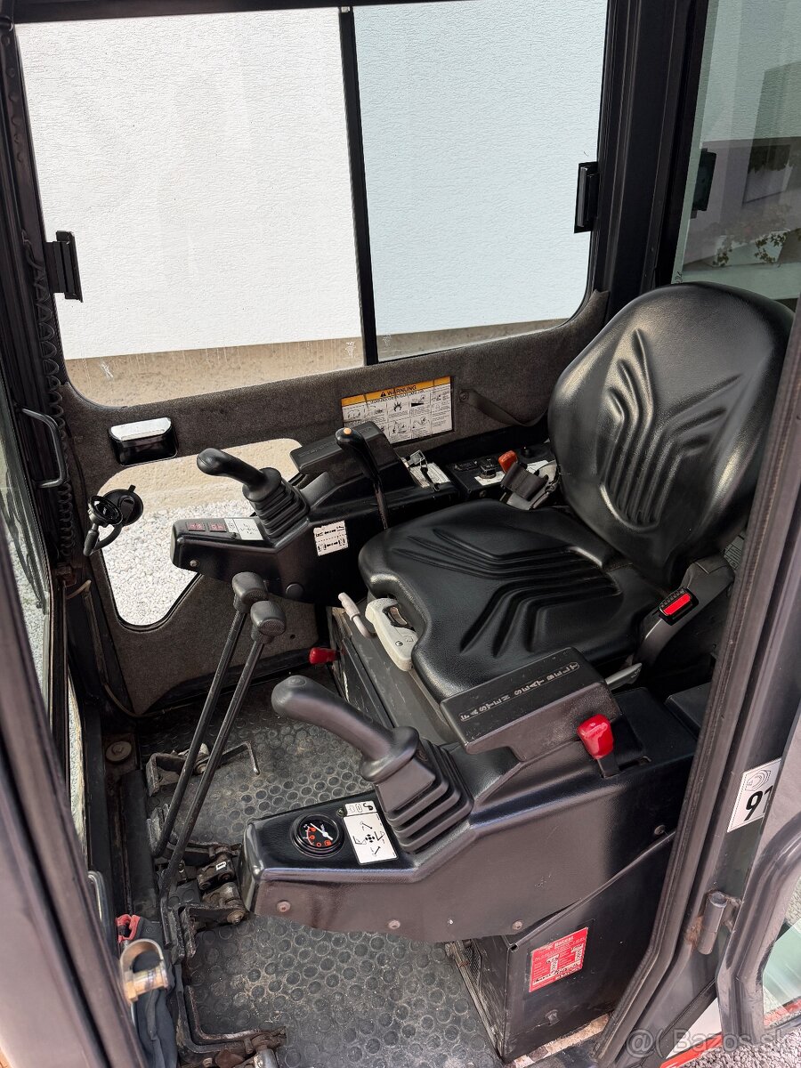 Minibager Bobcat 323 - 7