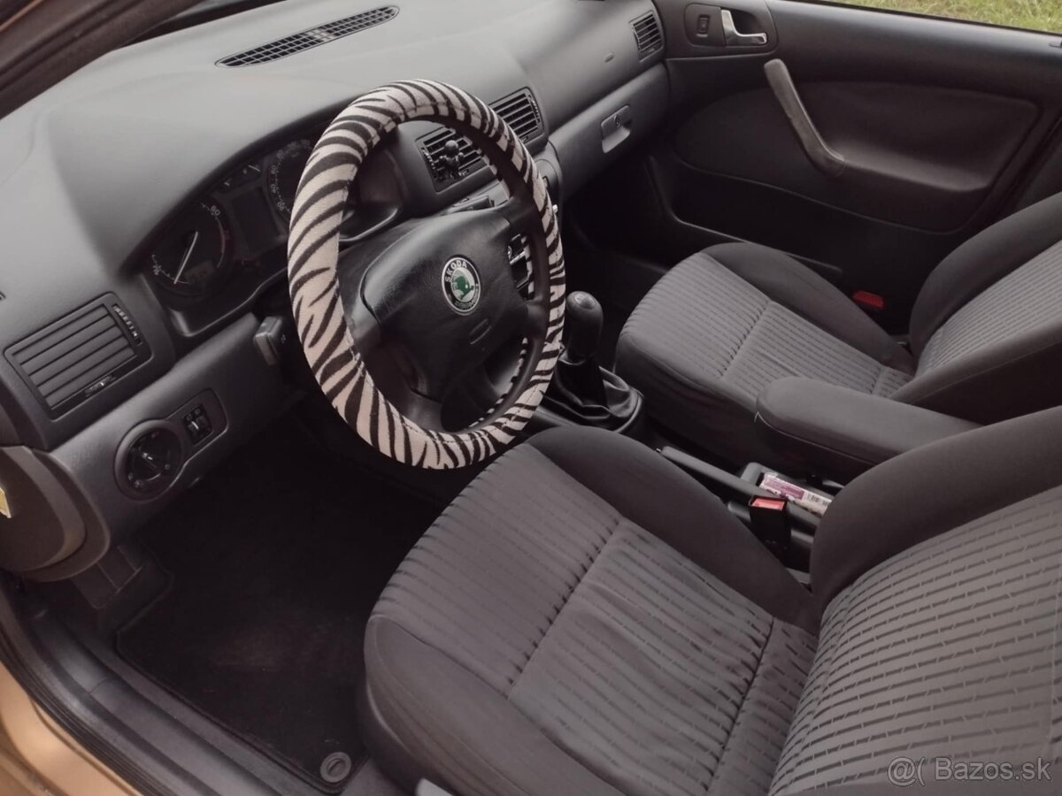 Predám Škoda Octavia 1.6i SR Elegance M5 5d S klímou - 7