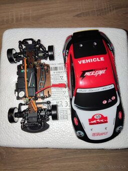 RC auto Wltoys K969, 4WD, 1:28 - 7