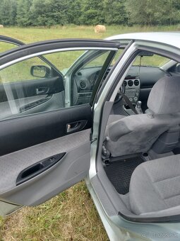 Mazda 6 (2003) • 104 kW • - 7