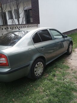 Octavia 1.6 benz 75kw - 7