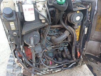 Minibager Bobcat 323 - 7