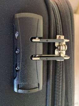 Malý cestovný kufor. - 7