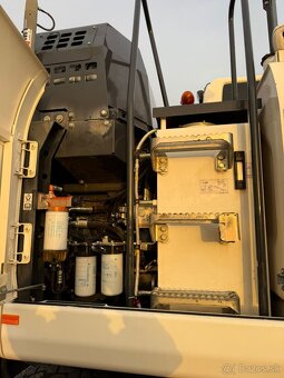 Kolový bagr KOMATSU PW148-11 - 7