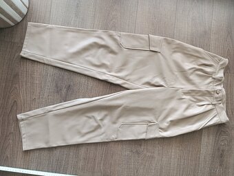 Koženkové nohavice 34 - 7