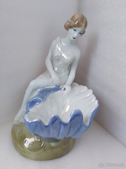 Dáma s mušlou. - 7