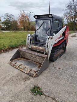 Pásový nakladač Takeuchi TL120. - 7