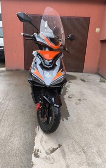 Adamoto 125 - 7