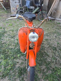 Motom Baina - 7