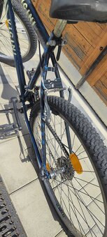 Starší horský bicykel - 7