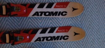 Detské lyže Atomic 90 CM , lyžiarky Rossignol 21,5 - 7
