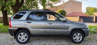 Predám SUV  Kia Sportage 4x4 2.0 TDI 103kw - 7
