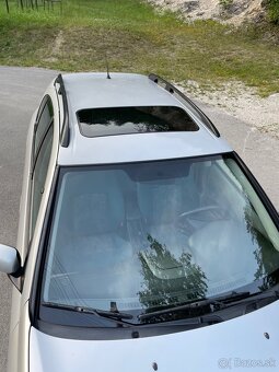 Nissan Almera N16 hatchback - 7