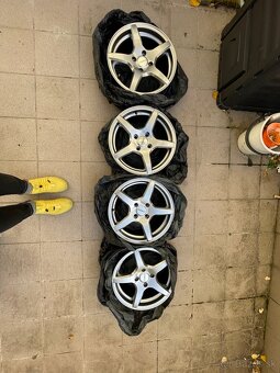Dezent TY 7Jx16 4x108 stred 67 - 7