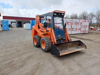 LOCUST L 753 nakladač smykový - 7