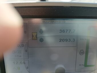 John Deere T660i. - 7