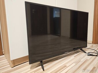 Predám konzolu PS4 a televízorom THOMSON 32HD5506 - 7