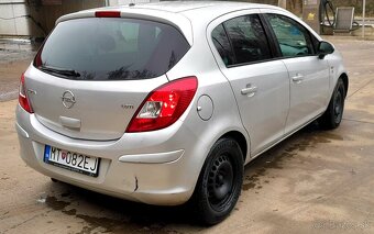 Opel corsa 2011 - 7