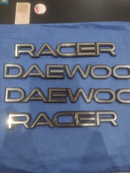 Predám stredové puklicky, volant a manuál na Daewoo Racer - 7