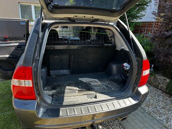Sportage 2,0i ,4x4 - 7