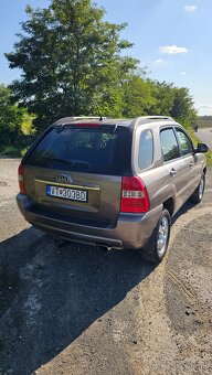 Kia Sportage 2.0 - 4x4 benzin - 7