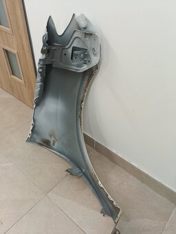 Predný ľavý blatník Dacia Logan - 7