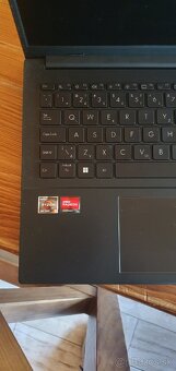 Asus Vivobook Go - 7