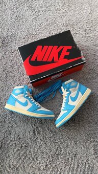 Air Jordan 1 Retro High OG UNC Reimagined - 7