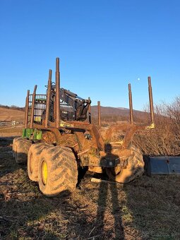 Vývozka John Deere 1110E - 7