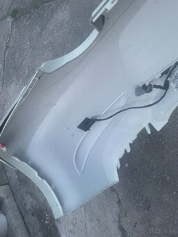 Predám originál zadný nárazník na Opel Corsa D - 7