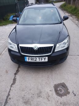 Rozpredám škoda Octavia 2 combi 1,6 tdi - 7