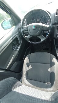 Škoda Roomster Scout 1.6tdi - 7