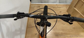 Rock Machine Blizzard XCM 70 (velkost L 19") XT/SLX - 7