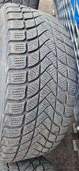 Predám zimný komplet na audi. - 7