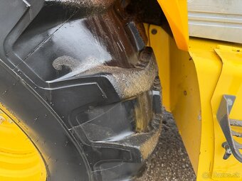 NEW HOLLAND traktor báger 2006 VIN 028 - 7