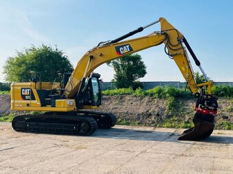 Pásový bager Caterpillar 323 - 7