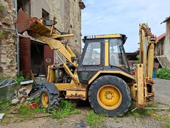 CATERPILLAR 428B 4X4 - 7