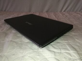 Asus K. Intel i5. RAM 16GB. Nový SSD 256 GB. Nvidia 2 + 3,9 - 7