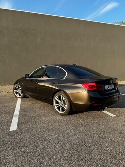 BMW rad 3 320d Sport Line A/T - 7