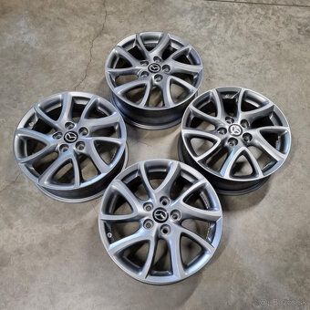 Mazda disky 5x114,3 R17 6,5J ET52,5 - 7