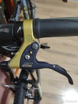 HORSKÝ BICYKEL KELLYS - 7