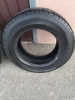 Predám letné pneu 215/70 R16 - 7