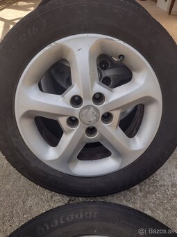 Pneumatiky na diskoch Opel - 7