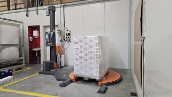 BALIACI STROJ NA PALETY - VÝREZ V TOČNI PRE VJAZD PALEŤÁKU - 7